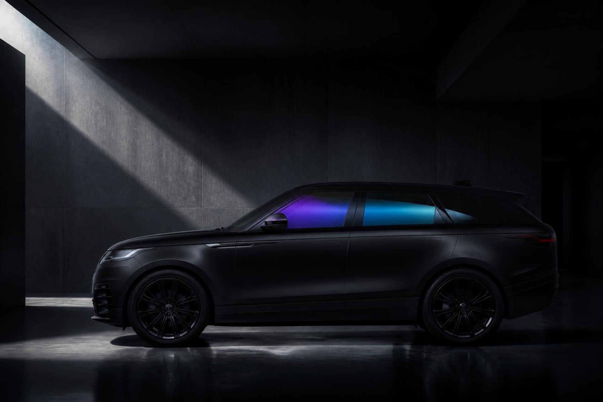 Matte black luxury SUV with iridescent tinted windows